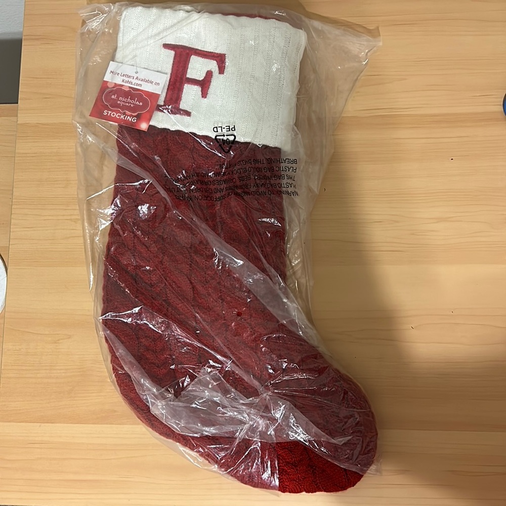 Knit style Christmas stocking with with letter F